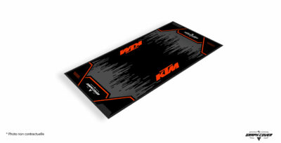 Alliez esthétique et performance avec le tapis sol moto KTM, spécialement conçu pour les passionnés de la marque autrichienne.